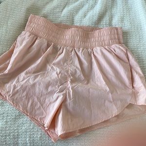 Women’s light pink running shorts size small